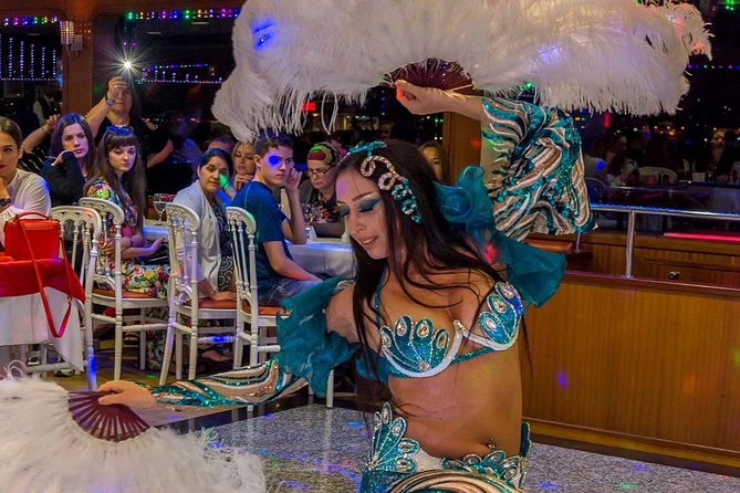 Bosphorus Dinner Cruise with Turkish Music and Live Performances - Dinner on board: how the meze, main course, and dessert usually land