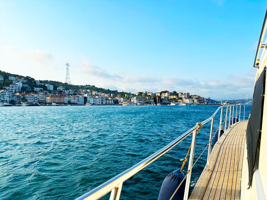 Istanbul: Bosphorus and Golden Horn Sunset Yacht Cruise - Moving into fortresses and palaces: Rumeli, Fatih Sultan Mehmet, Beylerbeyi