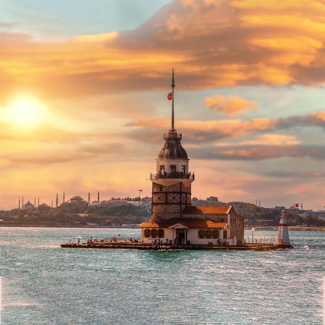 Istanbul: Bosphorus Cruise from Europe or Asia & Audio Guide - What you see early on: Dolmabahçe Palace and the palace-lined shore