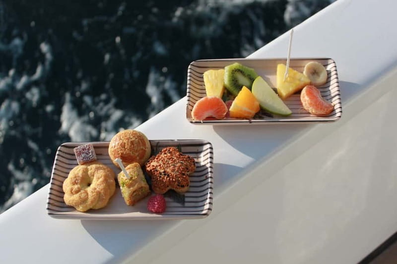 Istanbul: Bosphorus Private Guided Yacht Cruise with Snacks - Galata Side: Galata Bridge, Tower, and Galataport Waterfront Time