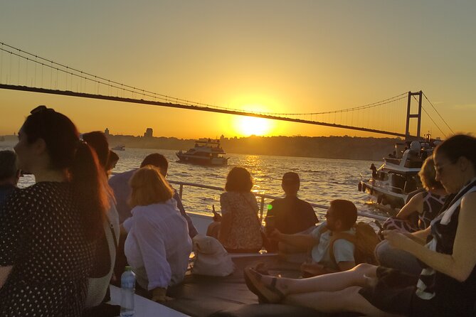 Istanbul Bosphorus Sunset Cruise with Wine on a Luxury Yacht - Europe shoreline highlights: Galata Tower, Dolmabahçe, Ortaköy, and the Bosphorus Bridge