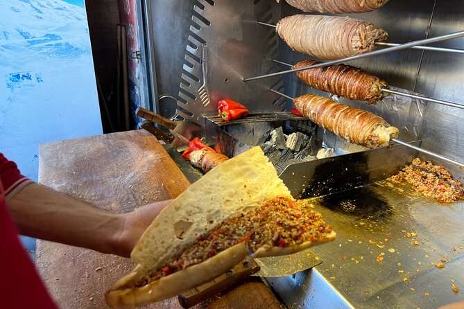 Istanbul Guided Street Food Tour Around European and Asian Sides - The Bosphorus ferry ride: views, plus a break from eating