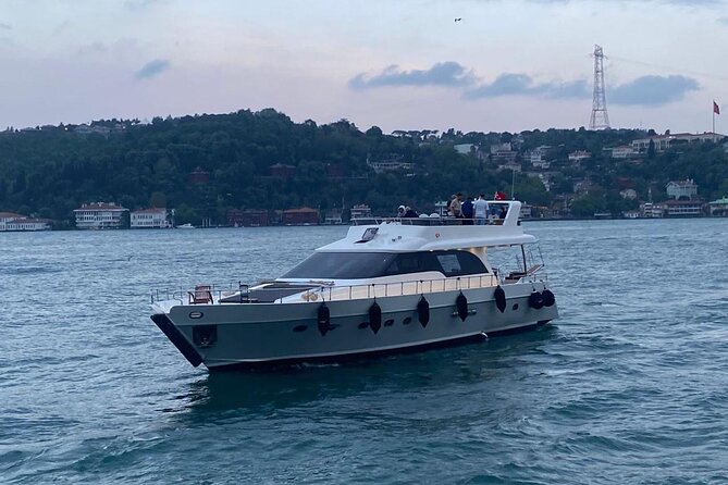 Istanbul: Private Bosphorus Tour On Luxury Yatch - Çırağan Palace on the Bosphorus shore, luxury restoration meets classic design