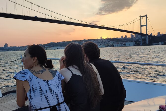 Istanbul Sunset Cruise on Luxury Yacht - Guided Group Cruise - Rumeli Hisarı and the Fatih Sultan Mehmet Bridge: fortresses and big engineering views